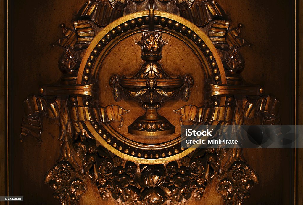 french floral plaque, bronzed hickory wood very intricate bronze hickory plaque Bronze - Alloy Stock Photo