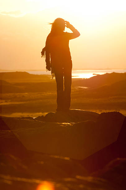 istock Woman at sunset 177313900