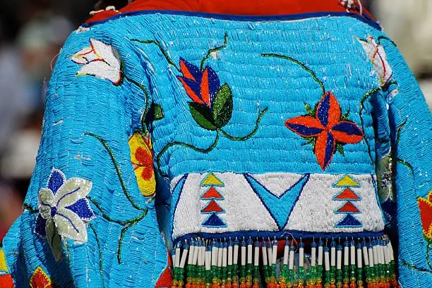 Beaded shawl of a Traditional Aboriginal Female Dancer at a powwow