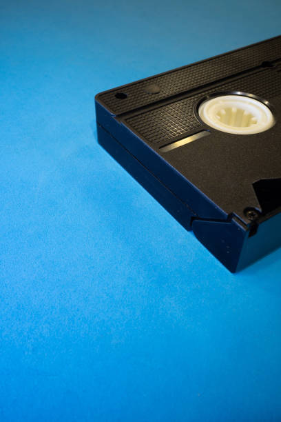 istock Used Vintage VHS Tape on a Blue Background 1773143295