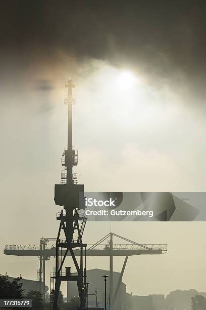 Port And Goliath Cran In The Sunrise Stock Photo - Download Image Now - Business, Crane - Machinery, Equipment