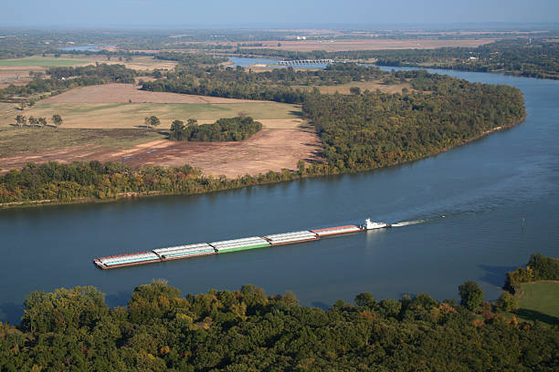 istock Barge traveling down Arkansas River Dam 177316362