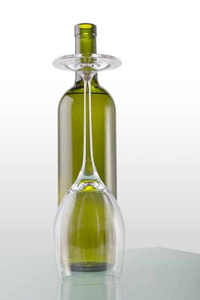 istock Bottle of white wine with glass upside down 177316628