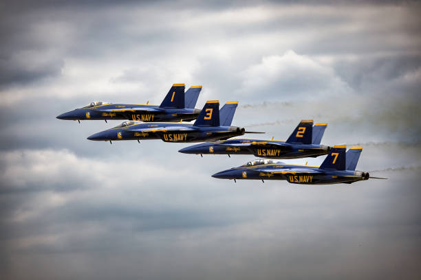 Angels in the Clouds Miramar, California, USA - September 21, 2023: The US Navy Blue Angels perform on a cloudy day at America's Airshow 2023. miramar air show stock pictures, royalty-free photos & images