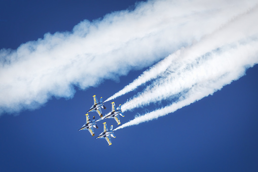 Miramar, California, USA - September 23, 2023: The US Navy Blue Angels in their diamond loop at America's Airshow 2023.