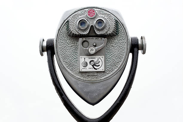 Coin operated binoculars Coin operated binoculars on white view finder stock pictures, royalty-free photos & images