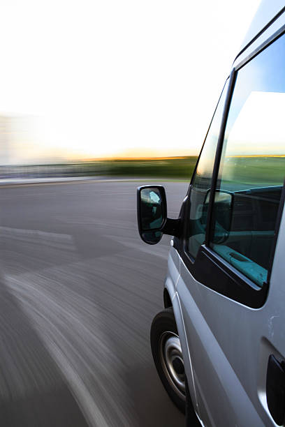 big van in fast drive stock photo