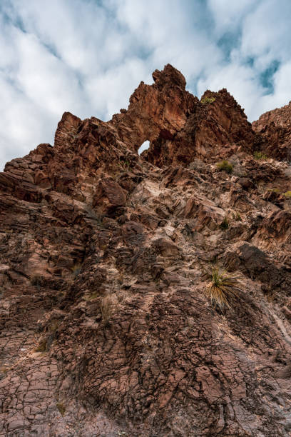 istock Tiny Arch Through Canyon Wall on the Way to Upper Burro Mesa Pouroff 1773188079