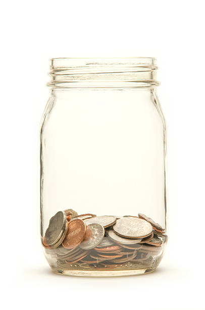 istock American coins in a jar 177319619