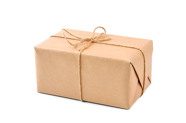 istock Cardboard carton wrapped with brown paper and cord 177320068