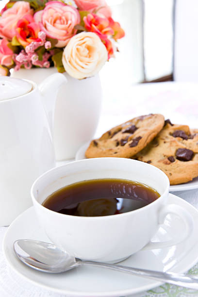 istock Cookie on white plate with black coffee and flower 177321794