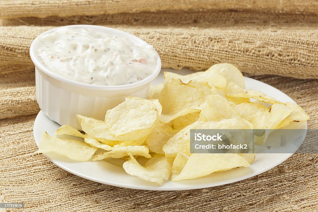 Fresh Potato Chips with Ranch Dip Fresh Potato Chips with Ranch Dip on a background Dipping Stock Photo
