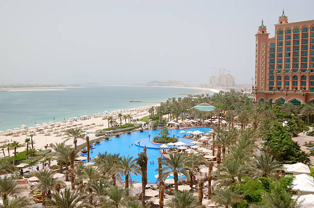 istock The beach and swimming pool at luxury hotel, Dubai, UAE 177322331