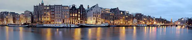 Panoramic city scenic at twilight in Amsterdam the Netherlands