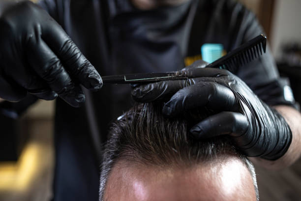 istock Barber at the haircut 1773237159