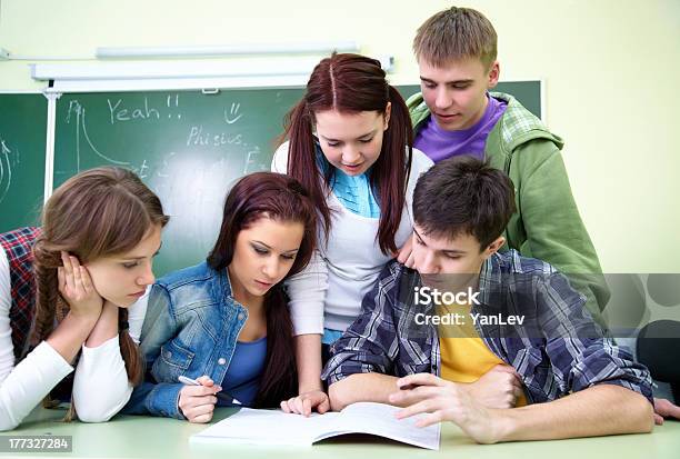 Five Students In Classroom Stock Photo - Download Image Now - Adolescence, Adult, Assistance