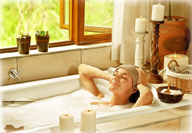 istock A woman relaxing in a bubble bath 177327533