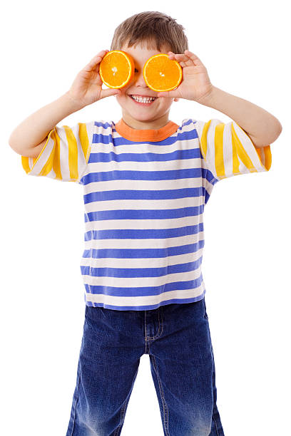 istock Funny boy with fruits on eyes 177327551