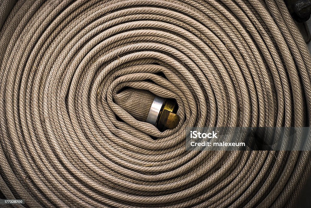 Wąż pożarniczy roll - Zbiór zdjęć royalty-free (Bezpieczeństwo)