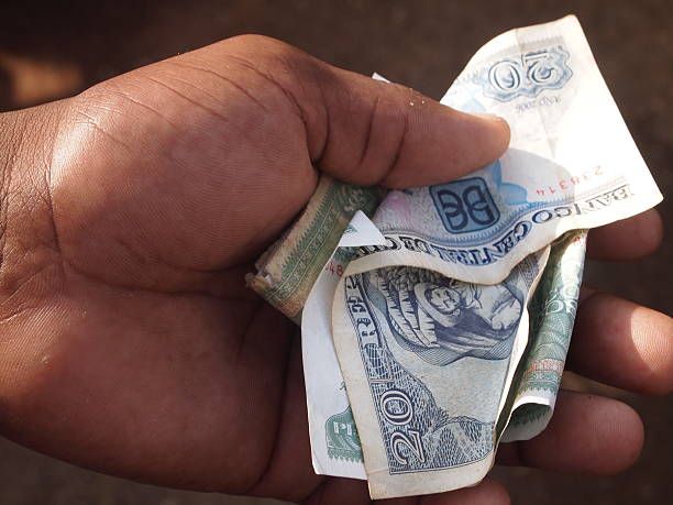 istock Cuban National Peso (CUP) in the Hand 177329530