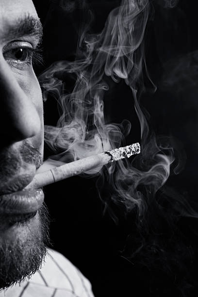 istock Face of young man with a cigarette 177329641