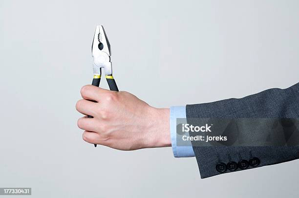 Holding A Tool Stock Photo - Download Image Now - 20-24 Years, 2000-2009, 21st Century