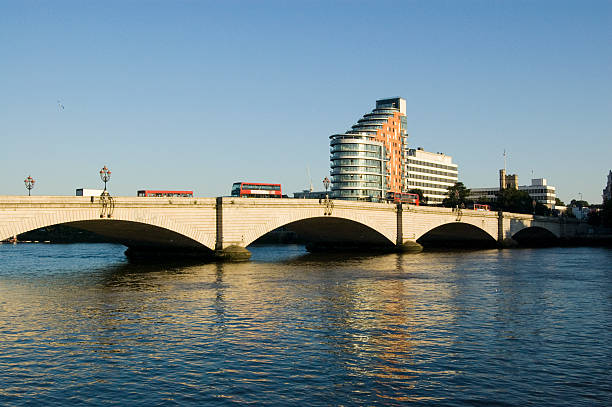 Putney Bridge, London View from the banks of the River Thames at Fulham of Putney Bridge.  London. putney photos stock pictures, royalty-free photos & images