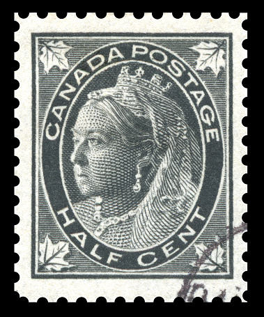 Antique late 19th century Canada  black half cent postage stamp showing an engraved image of Queen Victoria