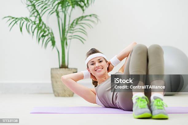 Happy Healthy Woman Doing Abdominal Crunch Stock Photo - Download Image Now - Active Lifestyle, Adult, Anaerobic Exercise