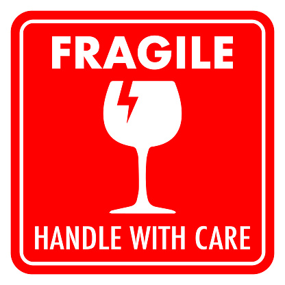 Vector graphic of fragile object and handle with care sign