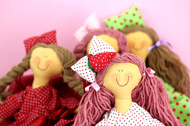 Four rag dolls stock photo