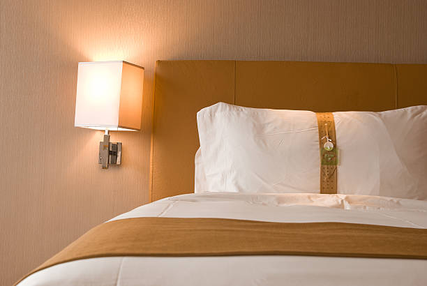 istock clean and tidy bed in a hotel room 177332571
