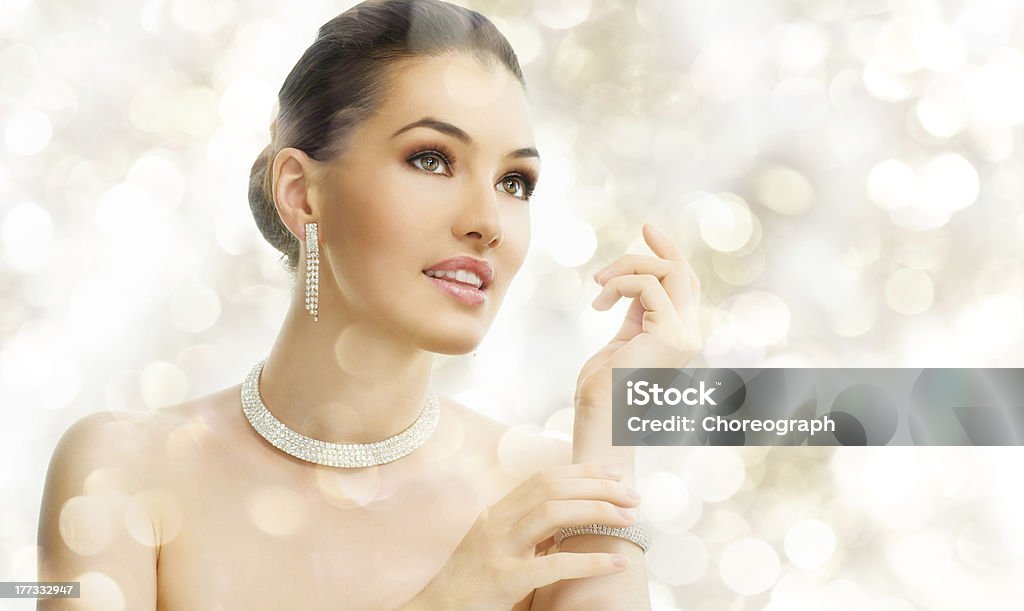 woman with jewelry portrait of beautiful woman with jewelry Glamour Stock Photo