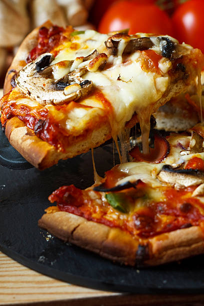 istock Funghi Pizza slice close up 177333166