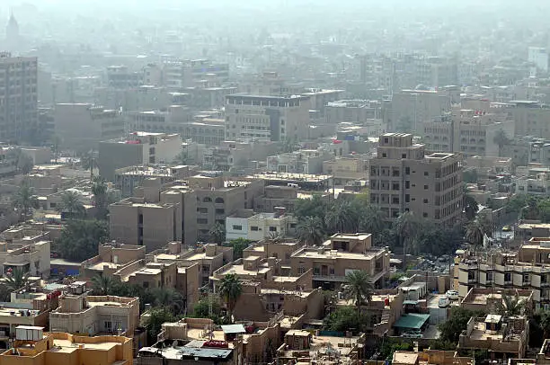 This skyline of downtown Baghdad with rooftops and terraces is a very typical urban view seen all over the Middle East.