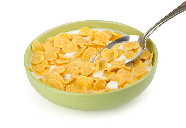istock Bowl of corn flakes with milk and spoon 177333541