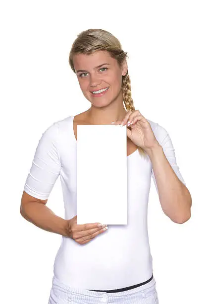 Blonde young woman is holding a blank sign.