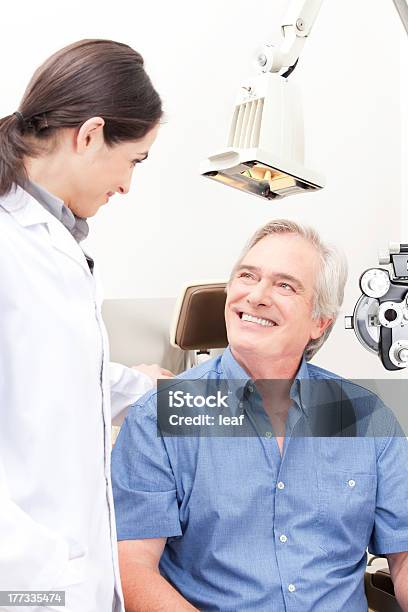 Optometrist Performing An Eyesight Test Examination Stock Photo - Download Image Now