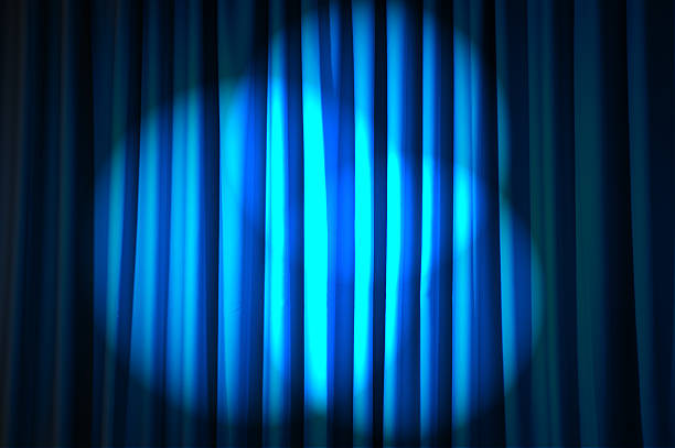 istock Brightly lit curtains in theatre concept 177336446