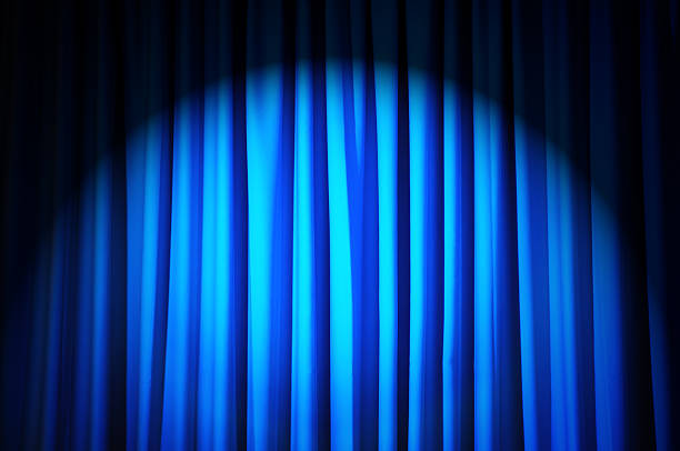 istock Brightly lit curtains in theatre concept 177336511