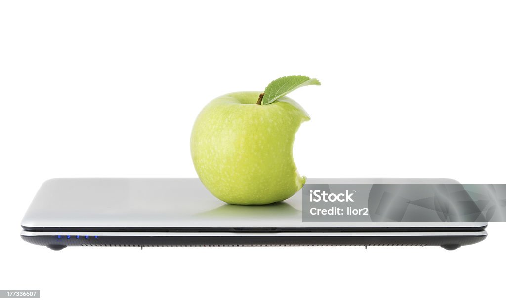 Green Apple In A Closed Laptop Stock Photo - Download Image Now - Apple -  Fruit, Missing Bite, Green Color - iStock