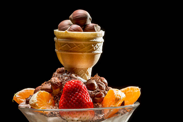 Fake fruit, dessert, ice cream still life in kitchen.