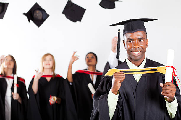 istock african graduate at graduation with classmates 177338253