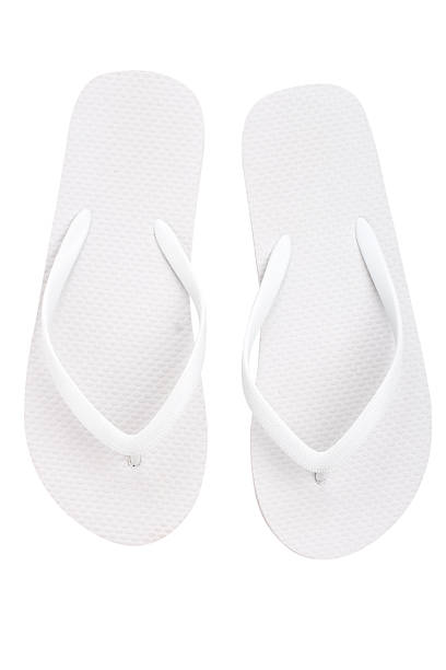 Pair of flip flops Pair of flip flops over white background slipper stock pictures, royalty-free photos & images