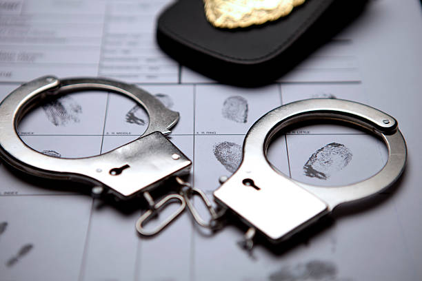 istock Detective Badge, Handcuffs And Fingerprints 177338572