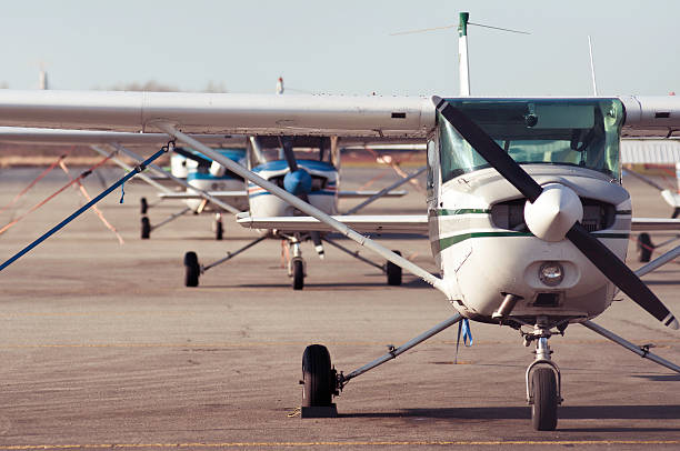 cessna lineup Lineup of cessna student airplanes bush plane stock pictures, royalty-free photos & images