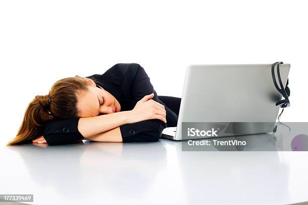 Tired Young Businesswoman With Laptop On White Background Studio Stock Photo - Download Image Now