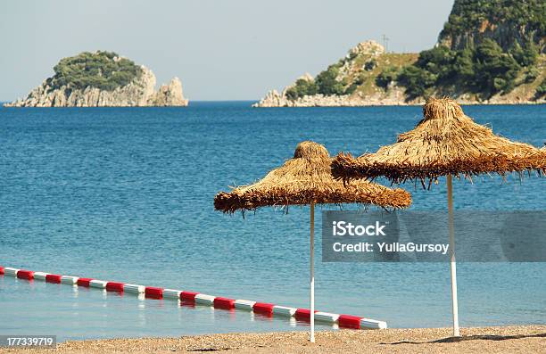 Umbrella On A Sandy Beach Stock Photo - Download Image Now - Aegean Sea, Asia, Beach