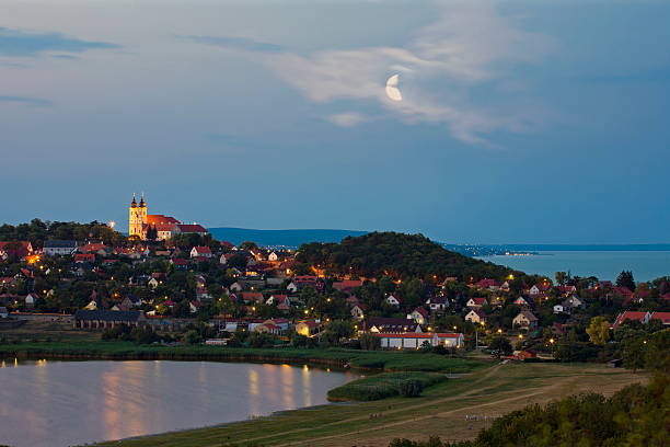 Benedictine Abbey of Tihany with the inner lake and Lake Balaton at twilight in Hungary