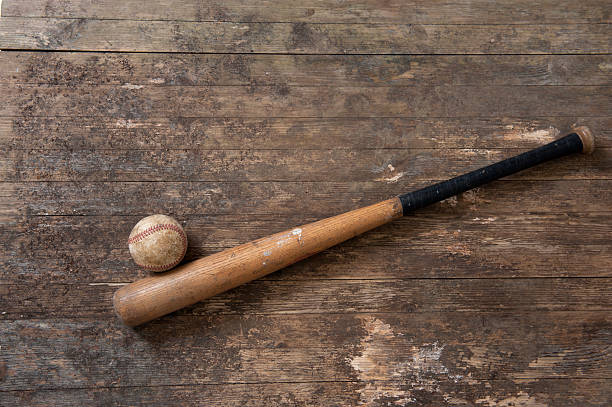 istock baseball bat and ball on old  grunge floor 177343166